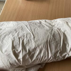 Ljusbeige IKEA percale-underlakan att sy om till kläder etc.